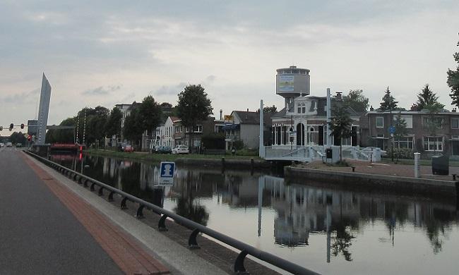 Reclameposter op watertoren: Waterdag bij WMD